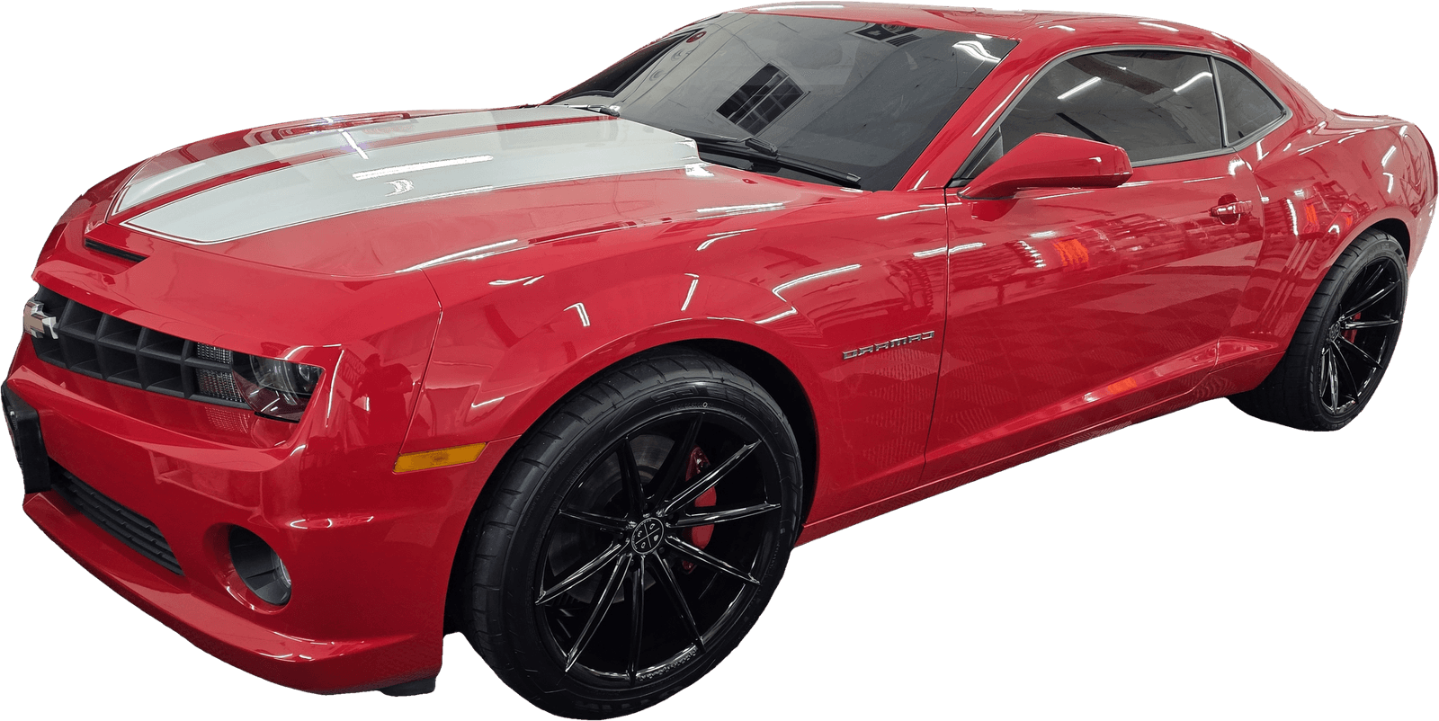 A glossy red Chevrolet Camaro with white racing stripes and a deep ceramic coated finish at Mr. G's Auto Care in Westminster, MD