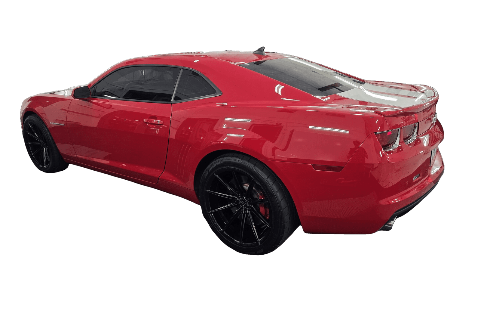 A glossy red Chevrolet Camaro detailed to a deep, reflective finish by Mr. G's Auto Care in Westminster, MD