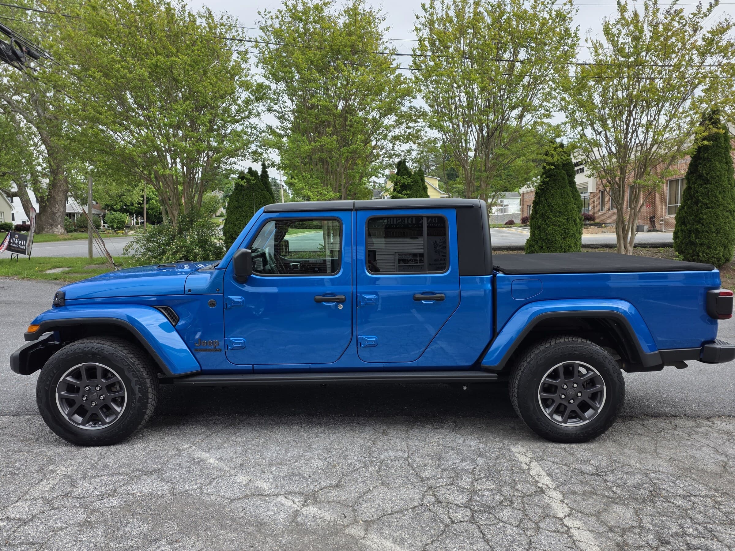 A fully detailed blue Jeep Gladiator photographed in Carroll County, MD